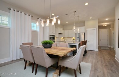SC-IN-Devaun Park-Sweetgrass Model-Eatin