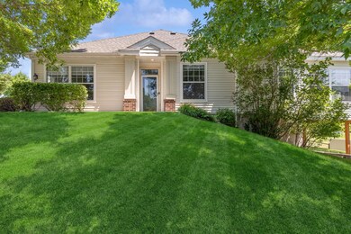 Another view of the main entrance to the home...located on the side of the home and overlooking a great lawn and mature landscaping.