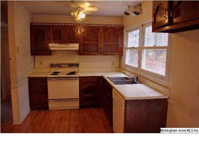 Kitchen with electric stove and dishwasher
