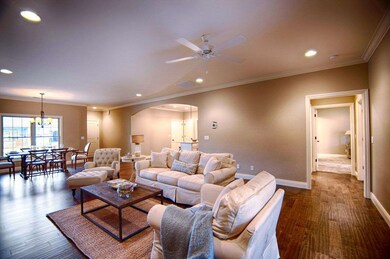Standard flooring is Engineered Hardwood in Living