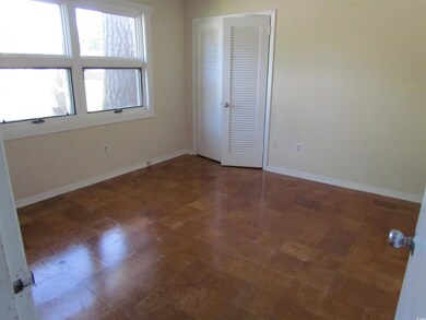 Spare room with parquet floors