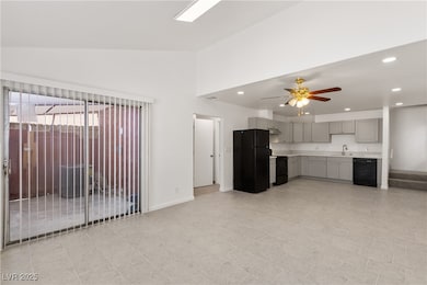 Unfurnished living room with a ceiling fan, basebo