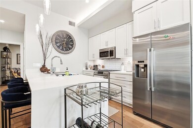 Modern kitchen with quartz countertops and gas sto