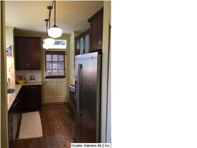 I love the beauty of this kitchen while still reta