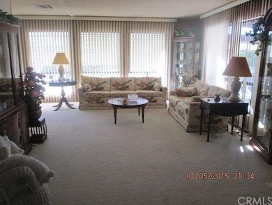 Living room with lots of windows and natural light