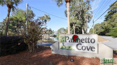 Located in desirable Palmetto Cove neighborhoos