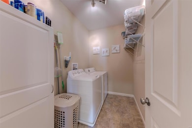 Spacious main floor laundry room.