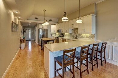 Large kitchen with an island and plenty of counter