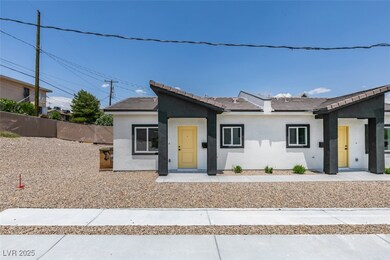 View of front of home featuring stucco siding and
