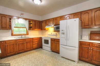 The kitchen has lots of cabinets and counter space