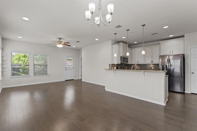 Kitchen with stainless steel appliances, a penins