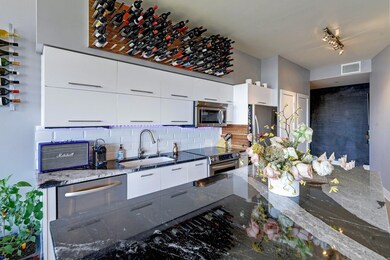 Kitchen featuring stainless steel appliances, a s