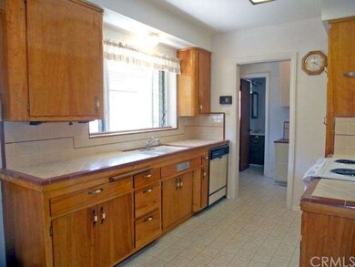Alternate view of kitchen with dishwasher, origina