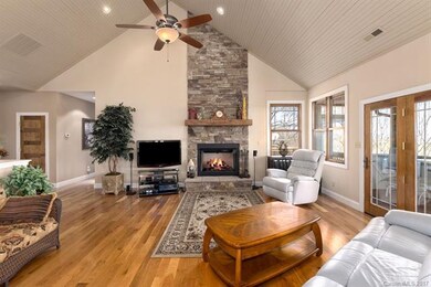Stacked stone fireplace in Great room with vaulted