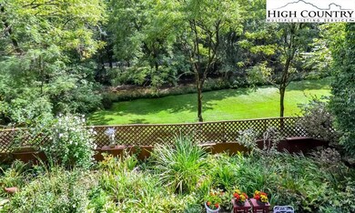 Overlooking the creek and mature flower gardens fr