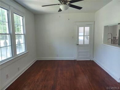 Living area freshly painted and new windows