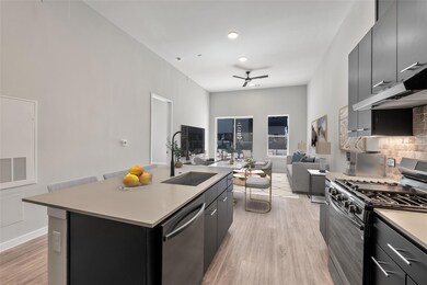Kitchen featuring appliances with stainless steel