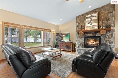 Floor to ceiling Stone Gas fireplace with natural 
