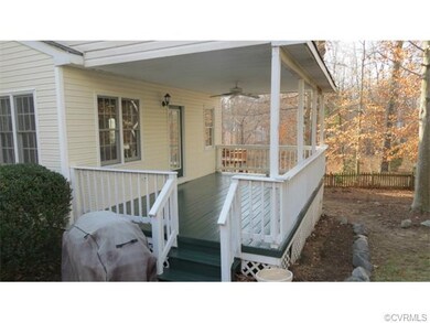 Rear covered deck.  Gas grill comes with the house