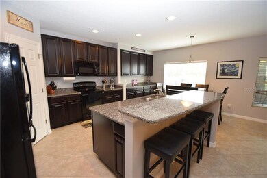 Extended Kitchen cabinet space with eat-in area; c