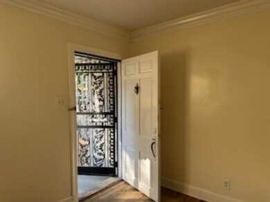 Interior space with ornamental molding and light h