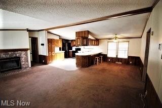 View of freshly painted great room, dining room an