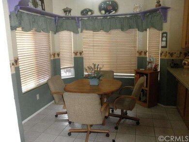 Breakfast nook with breakfast bar, ceramic tile fl
