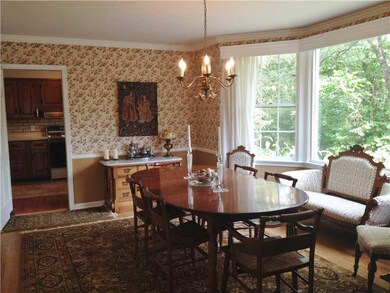 Dining Room. Bay windows are wonderful.  Hardwood 