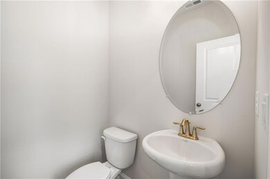 Bathroom with a sink and toilet
