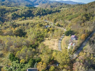 Property to the left of rd -with River in the dist