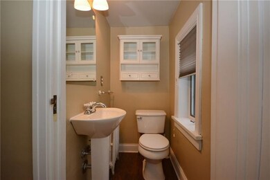 Two piece powder room on landing by front entrance
