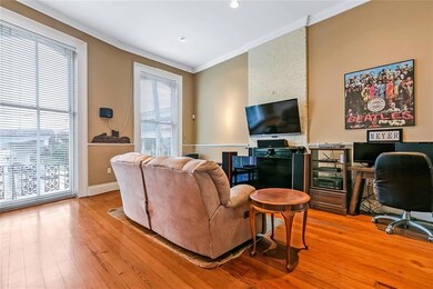 Old, refinished wood floors throughout the condo,