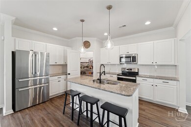 Gorgeoous sunlit kitchen with tile backsplash, cor