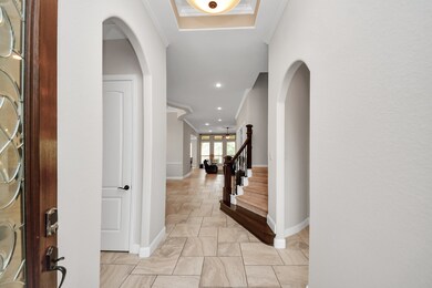 As you enter the home, a guest bedroom and full ba