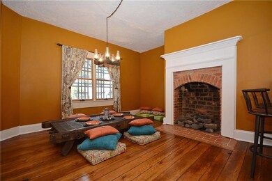Formal dining room w/ awesome original HW floors