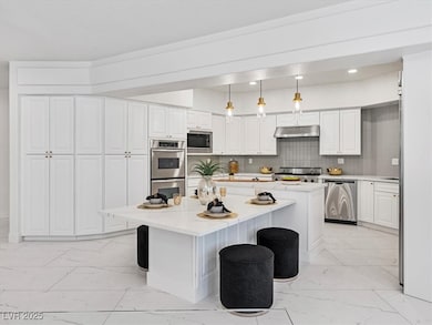 Kitchen featuring appliances with stainless steel