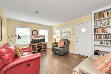The spacious living area provides a bright and inv