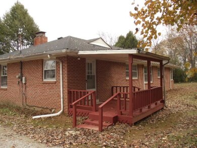 Newly redone deck provides the back entrance