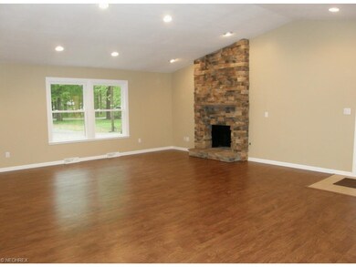 Open great room w/vaulted ceiling, floor to ceilin