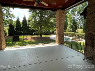 Back porch overlooking pool