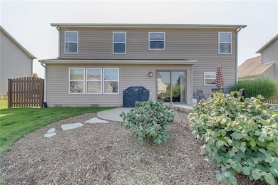 Yard was professionally landscaped when patio was installed. New Pella sliding patio doors. 