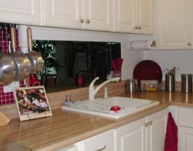 Kitchen pass thru to dining room