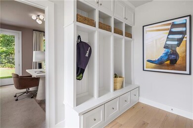 Mudroom with light wood-type flooring