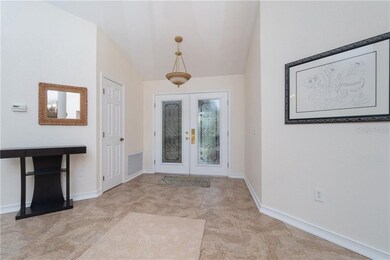 Double door entry with leaded glass. Coat closet