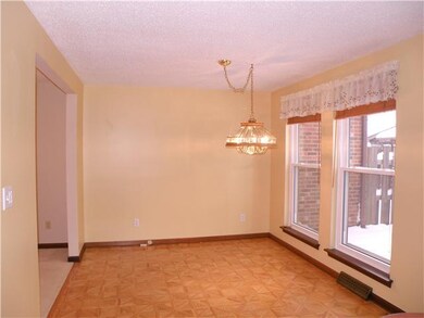 Kitchen. Eating area with floor-to-ceiling windows