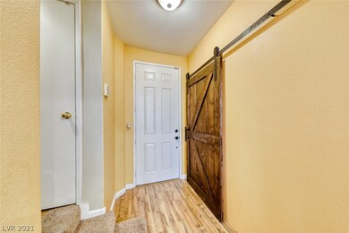 Downstairs den w/barn door (currently being used a