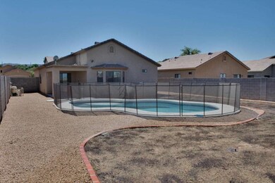 Backyard with beautiful pool and fencing