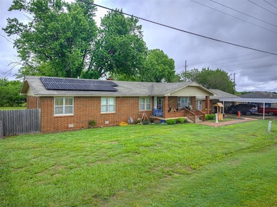 Single story home featuring brick siding, roof mou