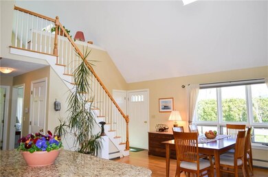 Front door and stairway to loft,...