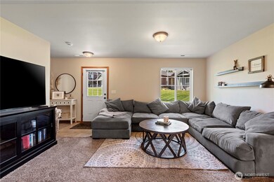 Large living area out to fenced yard and covered patio